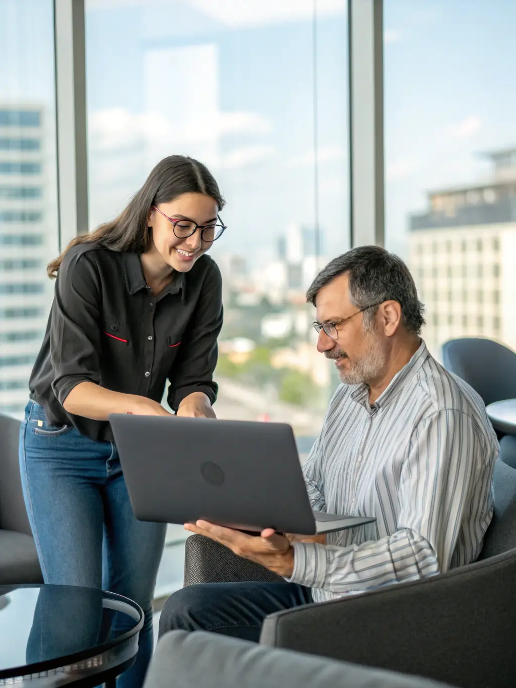 A software specialist implementing new software for a client, showcasing software implementation services.